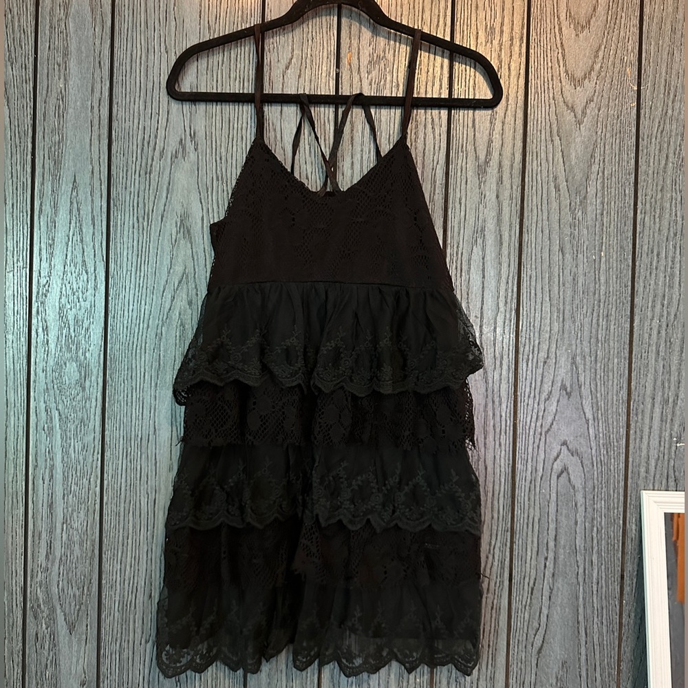 Black frilled part dress.